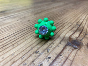 Flor verde con circonita de 10 mm